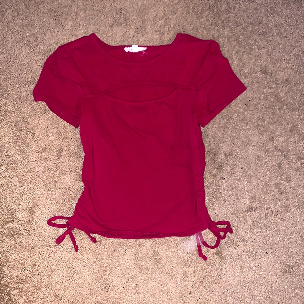 Red short sleeve crop top with tied sides and gap on chest from LAVIE 89